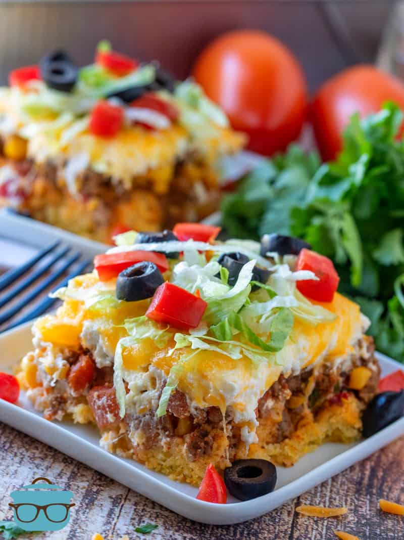 Easy Cornbread Mexican Casserole - two slices shown on two plates with forks