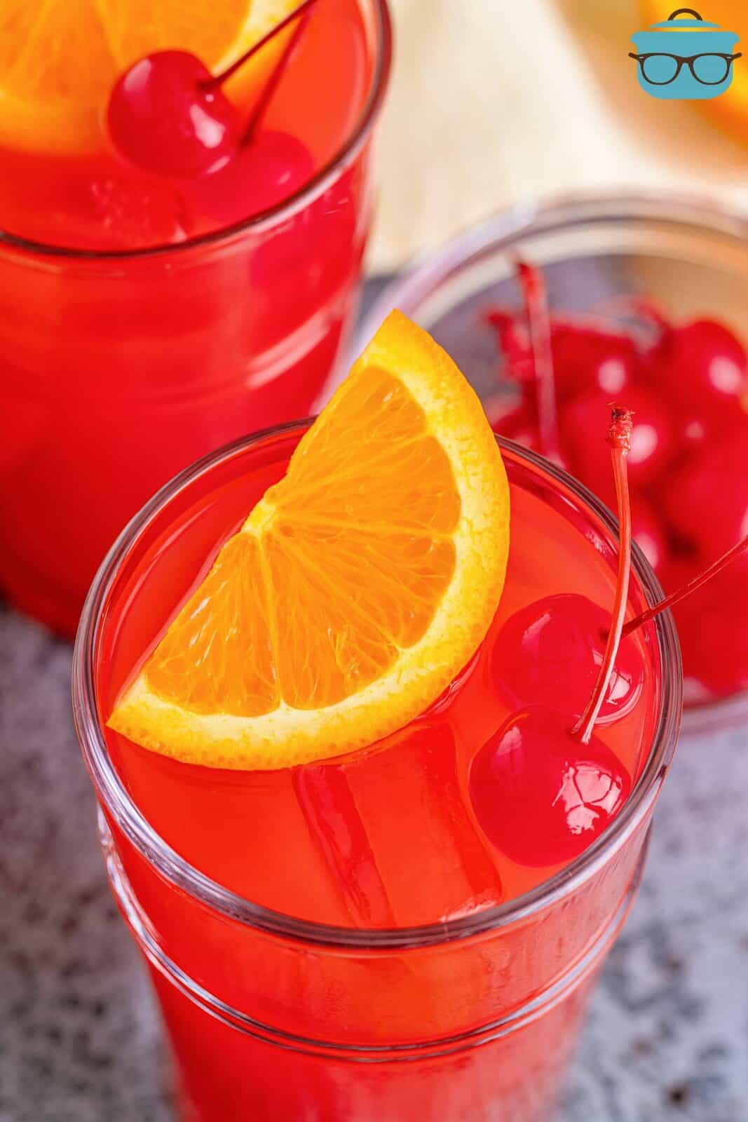 Overhead of Alabama Slammer garnished with orange and cherry.