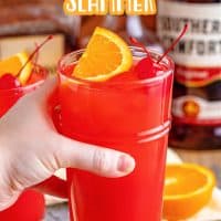 Pinterest image with hand holding one Alabama Slammer.