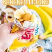 Hand holding one bag of Walking Banana Pudding Pinterest image